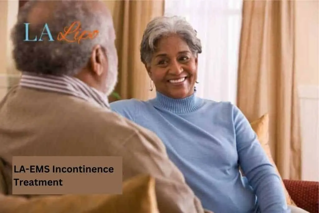 Couple sat smiling at each other - LA-EMS treatment Golders Green