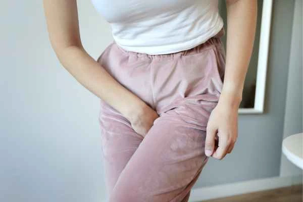 older woman running to the toilet because of urinary incontinence Golders Green